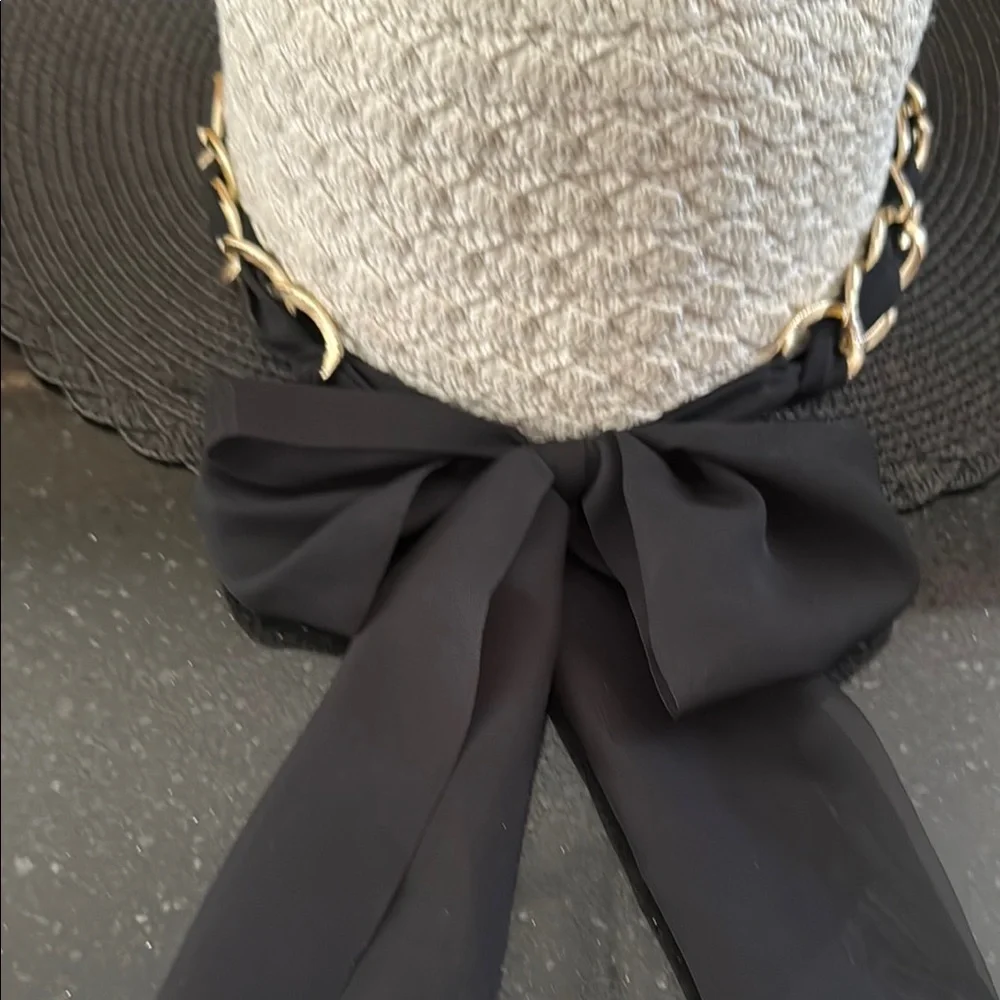 Cream and Black straw hat with chain and bow detail Chanel style